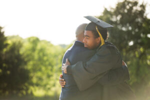 Graduating Student Hugging Dad