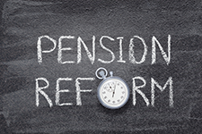 The words pension reform with a stopwatch